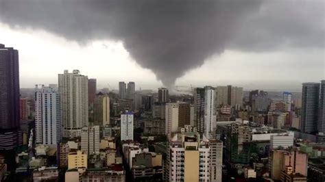 tornado in manila|Watch stunning footage of a rare tornado in Manila .